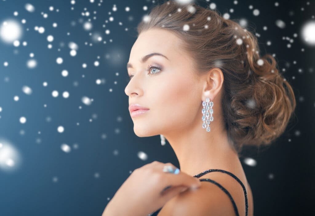 Gemstones and Fine Jewelry at Crown Diamond Jewelers 8 woman wearing fine earrings