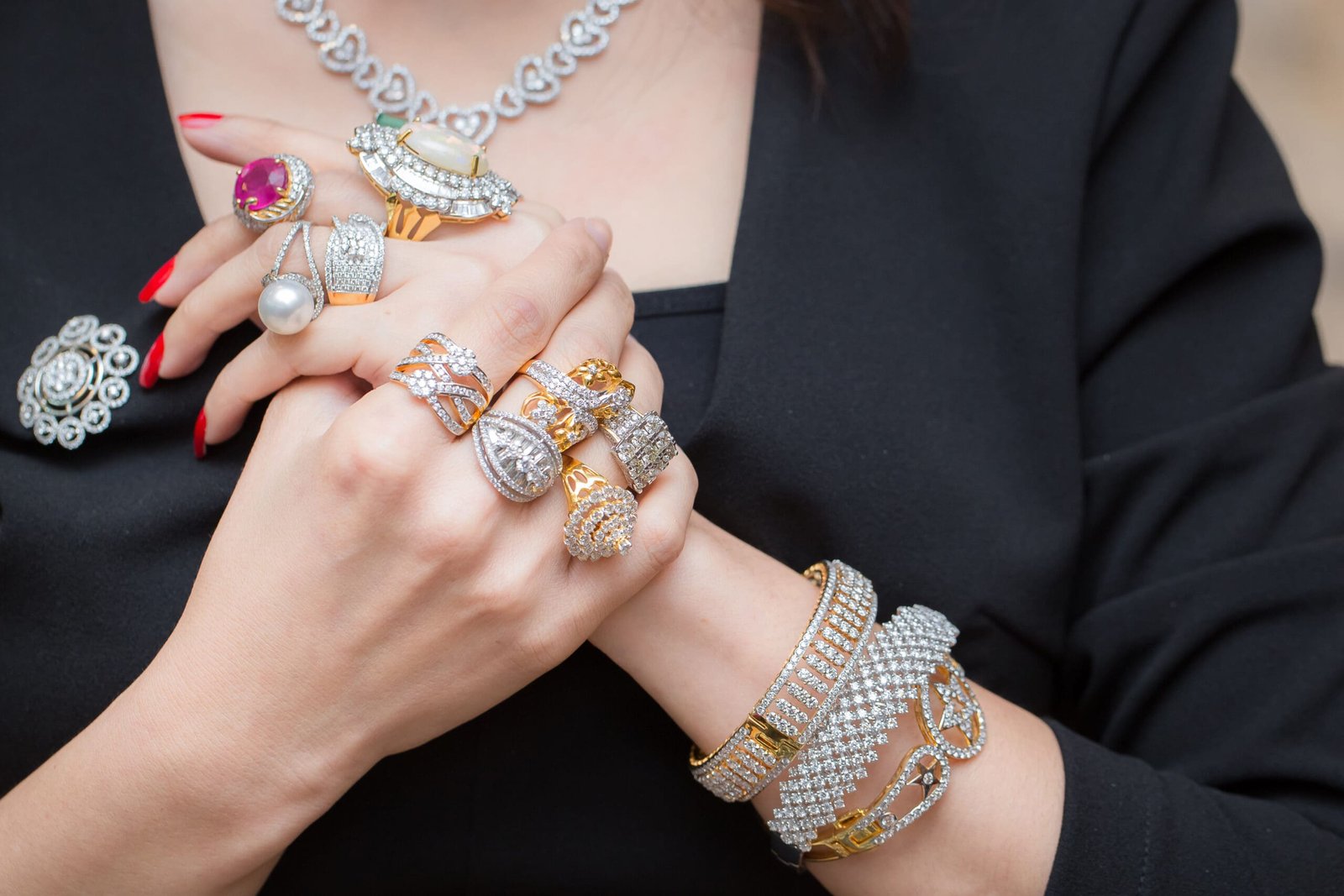 a woman wearing diamond jewlery