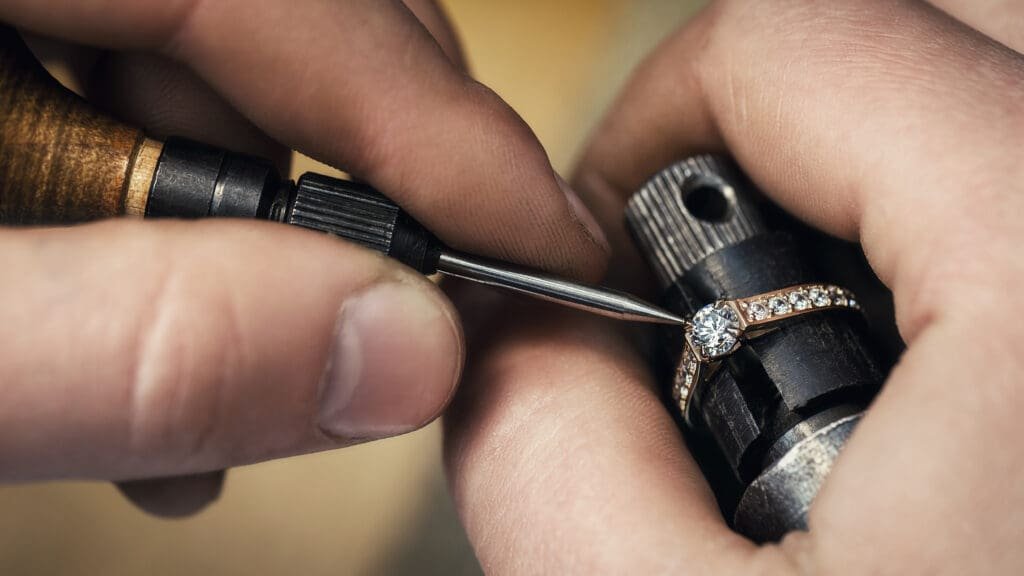 person repairing a ring