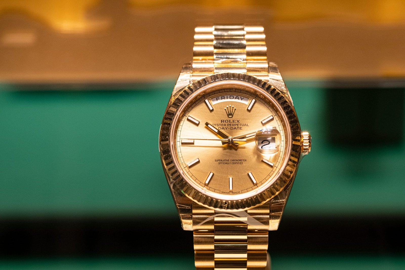 gold day-date rolex watch